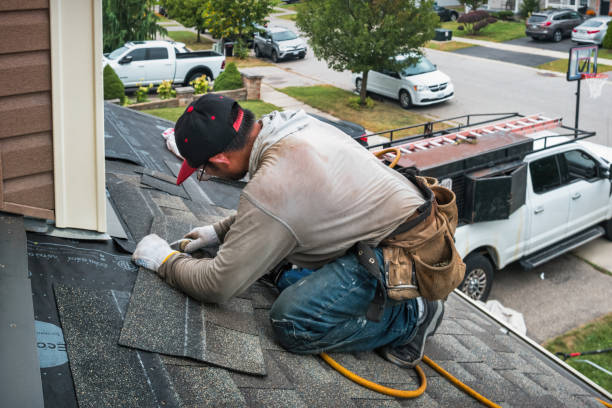 Professional Emergency Roof Repair technician working in Attleboro Falls, MA